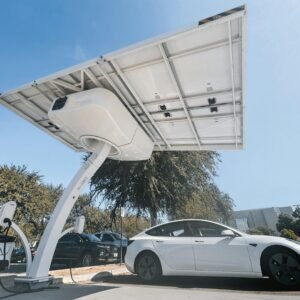 Electric car charging under a modern solar panel station, showcasing clean energy technology.